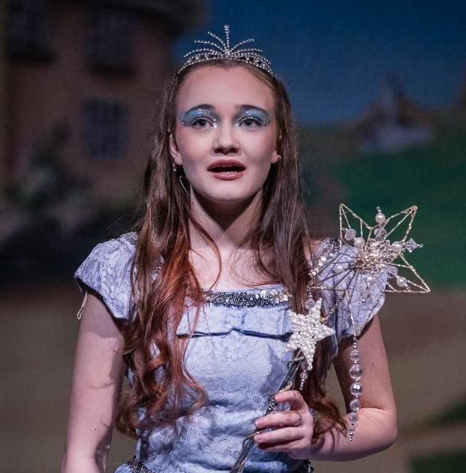 Girl on stage in good fairy costume